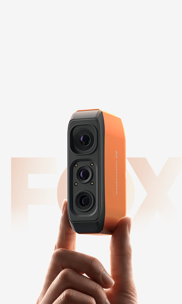 210g ultralight 3DMakerpro Fox 3D Scanner in bright orange, easily held by two fingers.