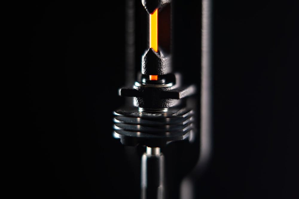 INDX Smart Head picking up a passive tool with induction heating visualized