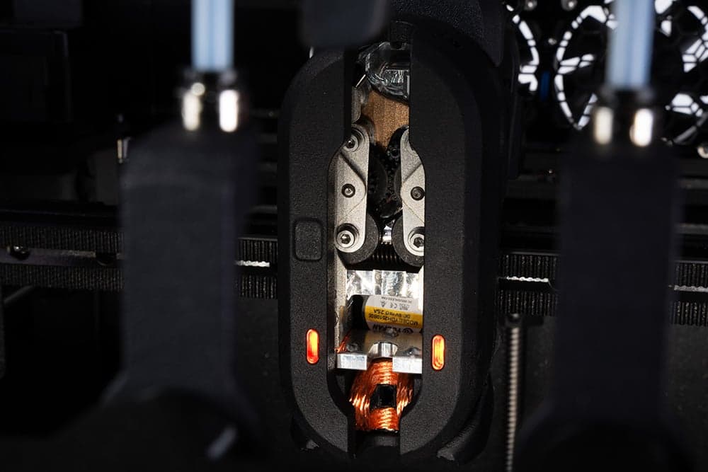 INDX Smart Head picking up a passive tool with induction heating visualized