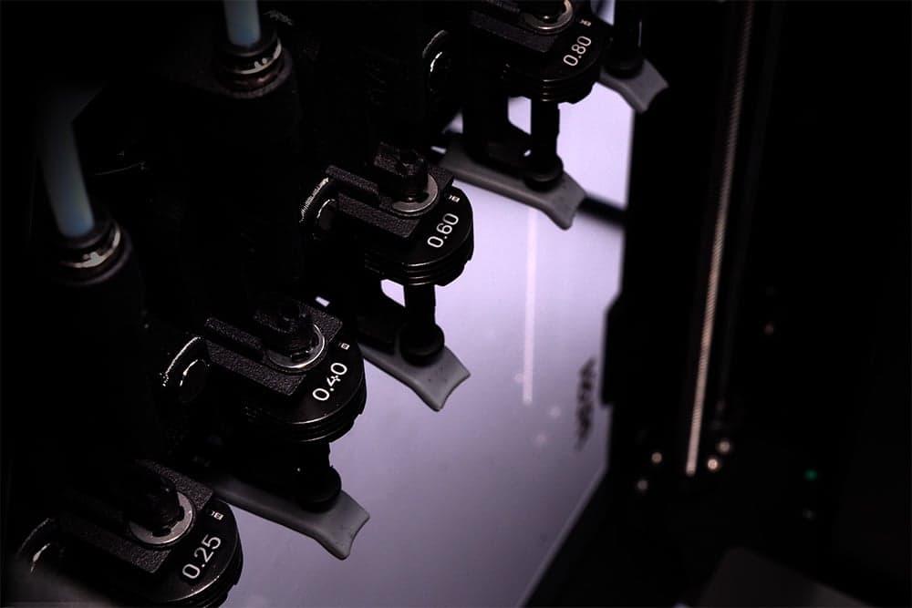 INDX Smart Head picking up a passive tool with induction heating visualized